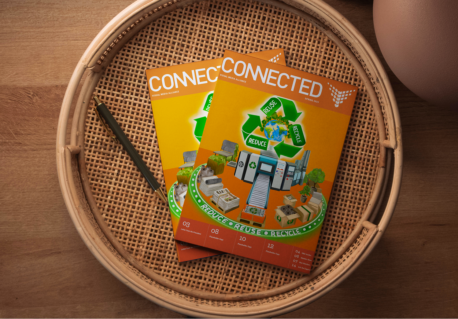 Connected magazine flat lay on rattan tray